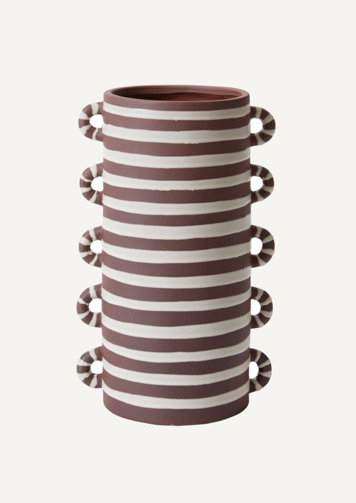 A brown and white ceramic vase with loopy decorative side handles.