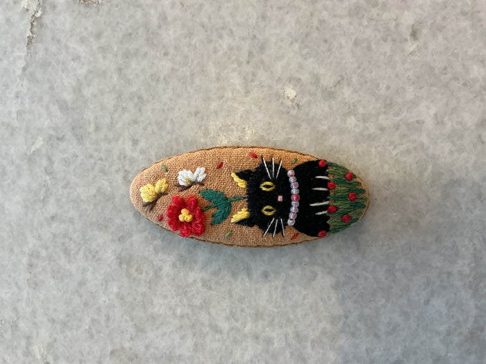 Black Cat on Tan with Red Flower