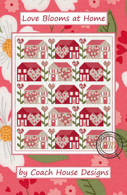 Cover of a lap quilt pattern with houses, flowers and hearts on a white background titled Love Blooms at Home by Coach House Designs.