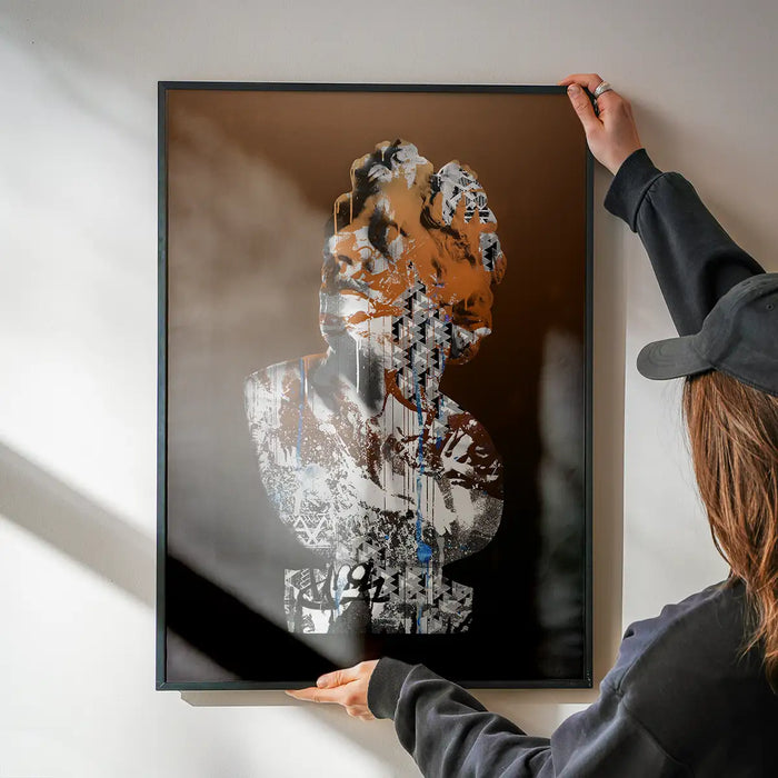 Framed Statue 1 Graffiti Print, a classic bust with urban art style and orange, white, and black colors.