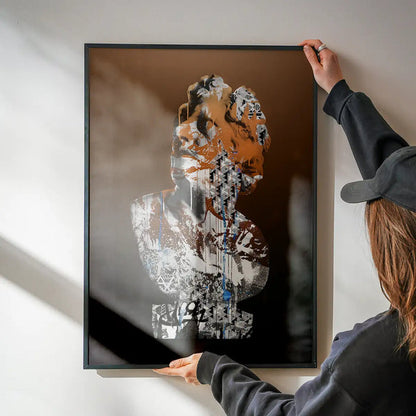 Framed Statue 1 Graffiti Print, a classic bust with urban art style and orange, white, and black colors.